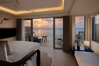Avani+ Fares Maldives Resort - Sunset Over Water Villa