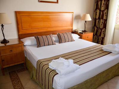 Continental Plaza Beach Resort - Family Room with Pool View