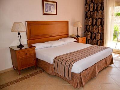 Continental Plaza Beach Resort - Family Room with Pool View