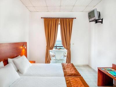 Xenios Dolphin Beach Hotel - Superior Double Room with Side Sea View